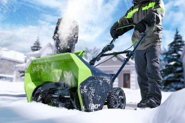 Greenworks battery-powered snow blower in use